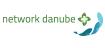 Das Logo zeigt den Schriftzug Netword Danube in grün. Rechts daneben ist eine stilisierte grüne Blüte mit stilisierten blauen Wellen darunter.